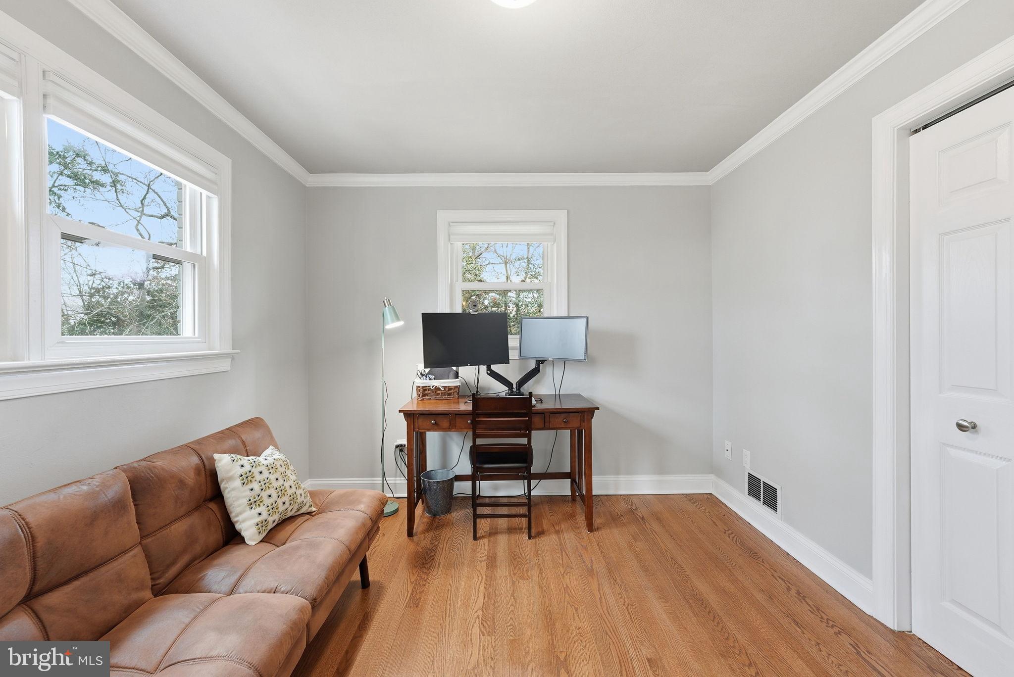 6803 Derrell Court Alexandria, VA 22307 - Photo 21 of 43 a living room with furniture and a window