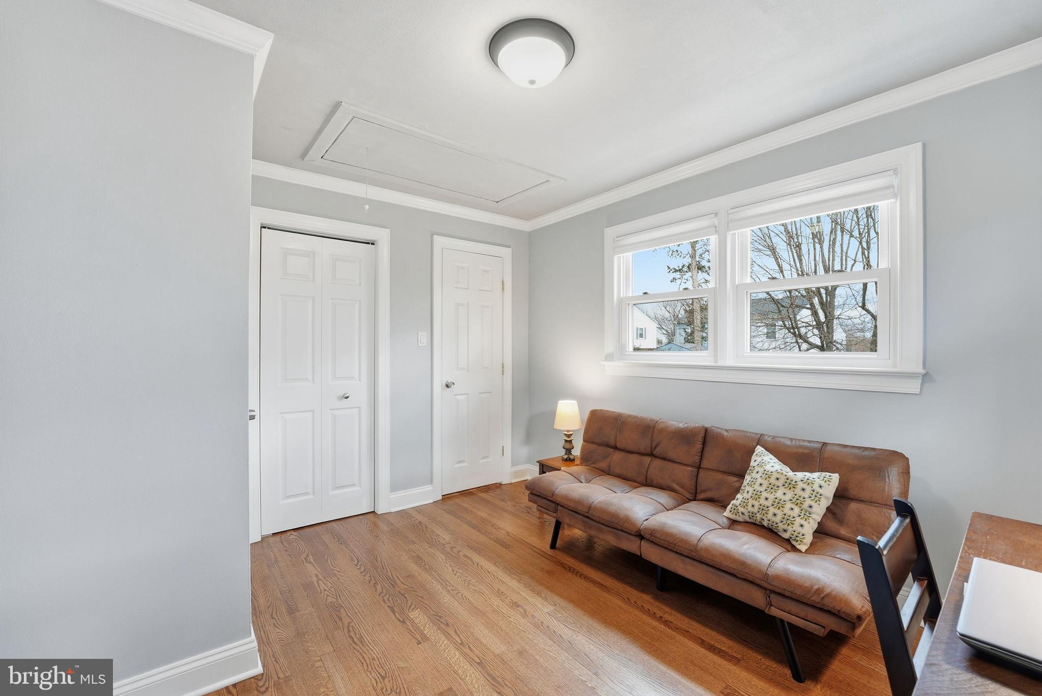 6803 Derrell Court Alexandria, VA 22307 - Photo 22 of 43 a living room with furniture and a window