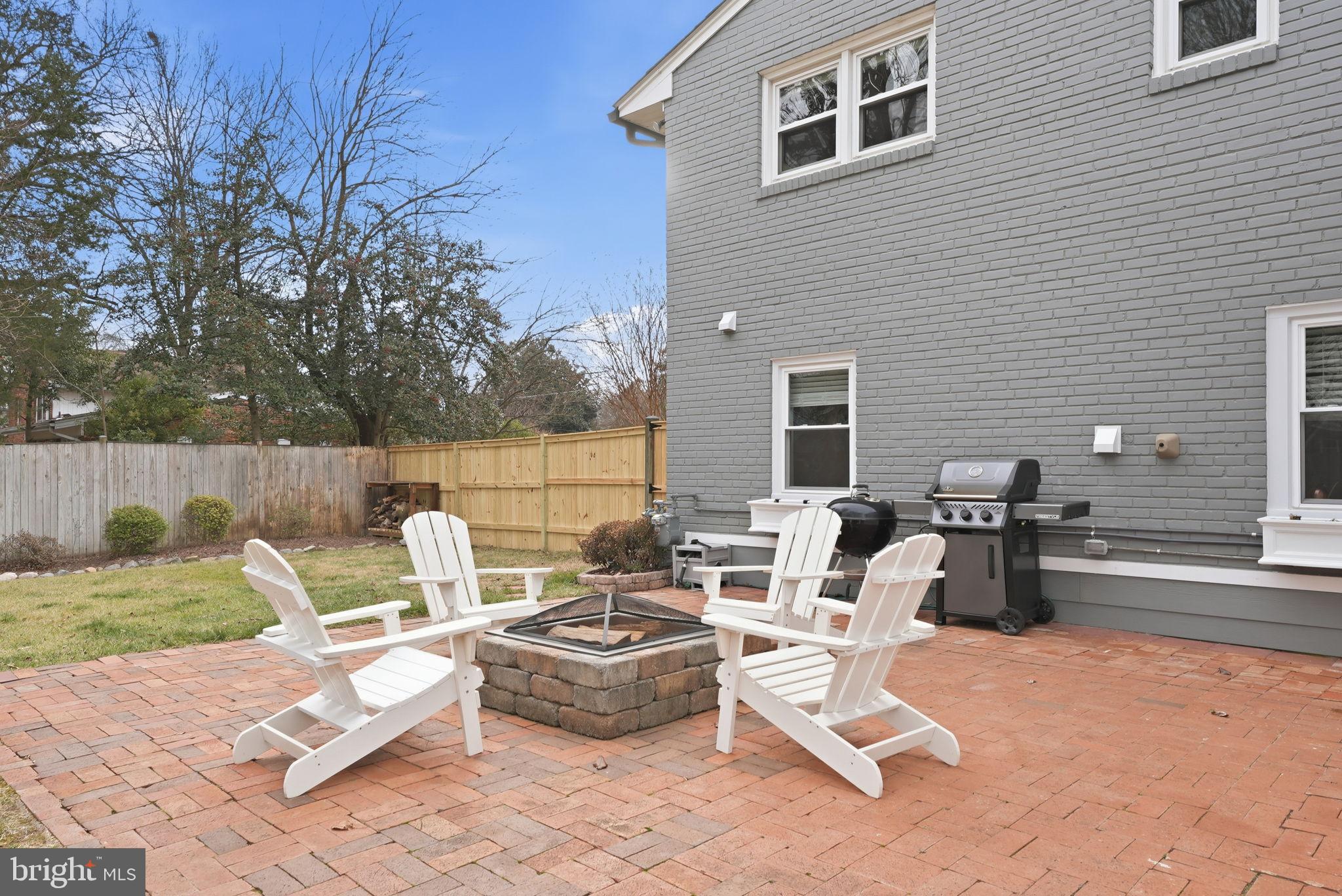 6803 Derrell Court Alexandria, VA 22307 - Photo 33 of 43 a view of a patio with chairs and tables