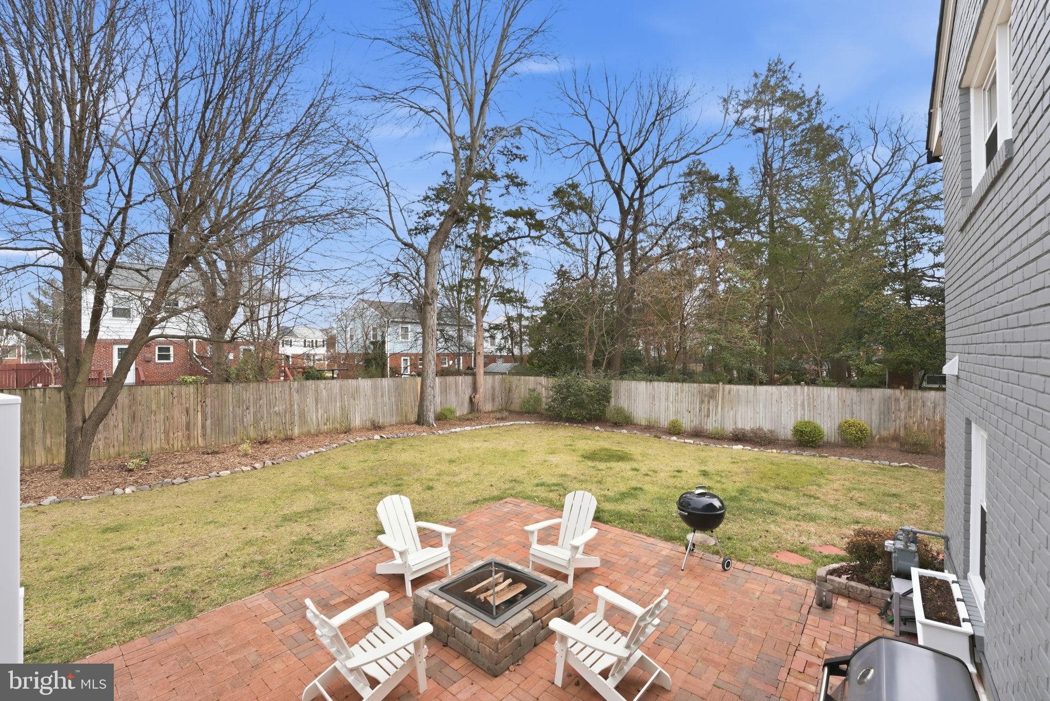 6803 Derrell Court Alexandria, VA 22307 - Photo 34 of 43 a view of backyard with swimming pool and seating space
