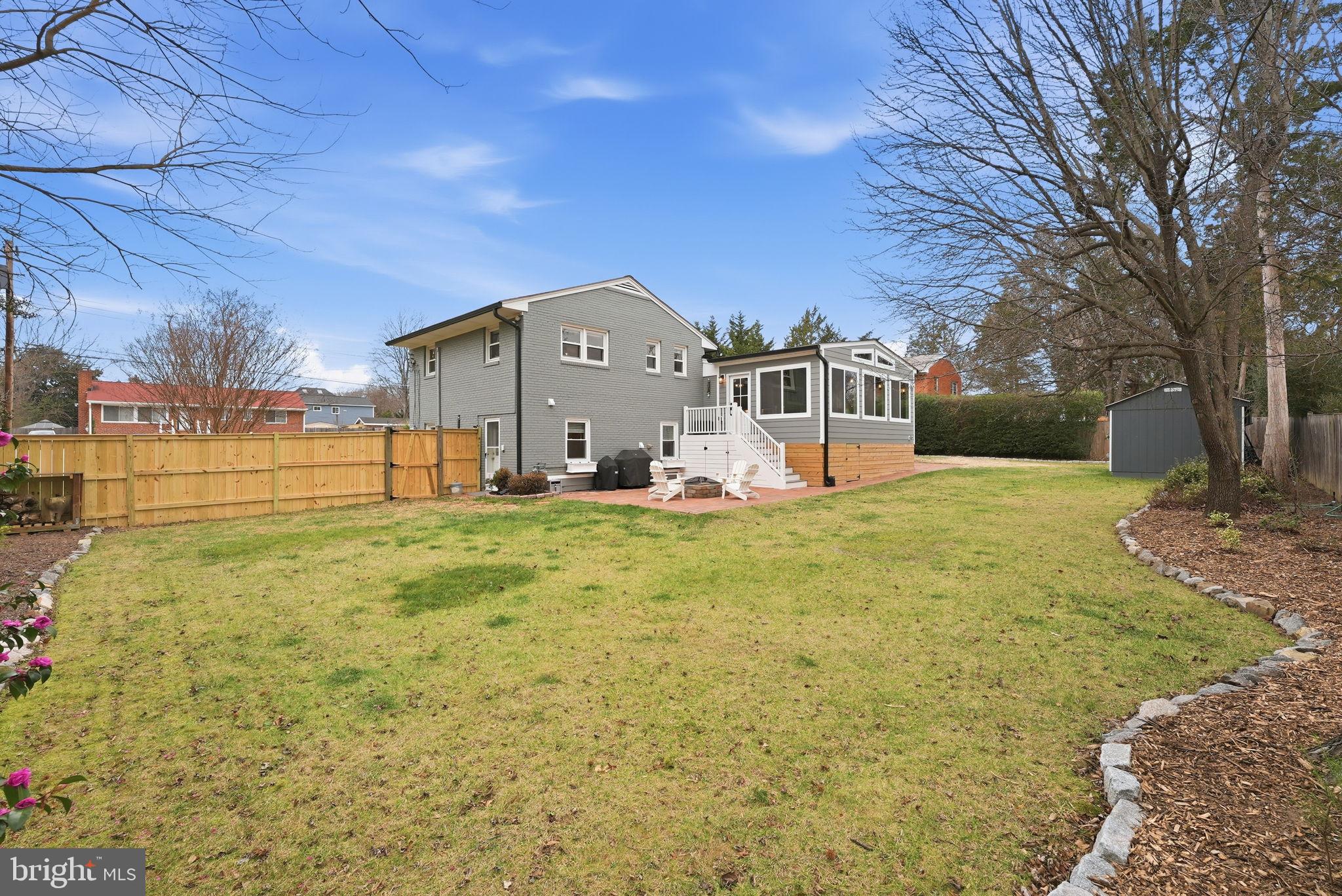 6803 Derrell Court Alexandria, VA 22307 - Photo 35 of 43 a view of a house with a yard