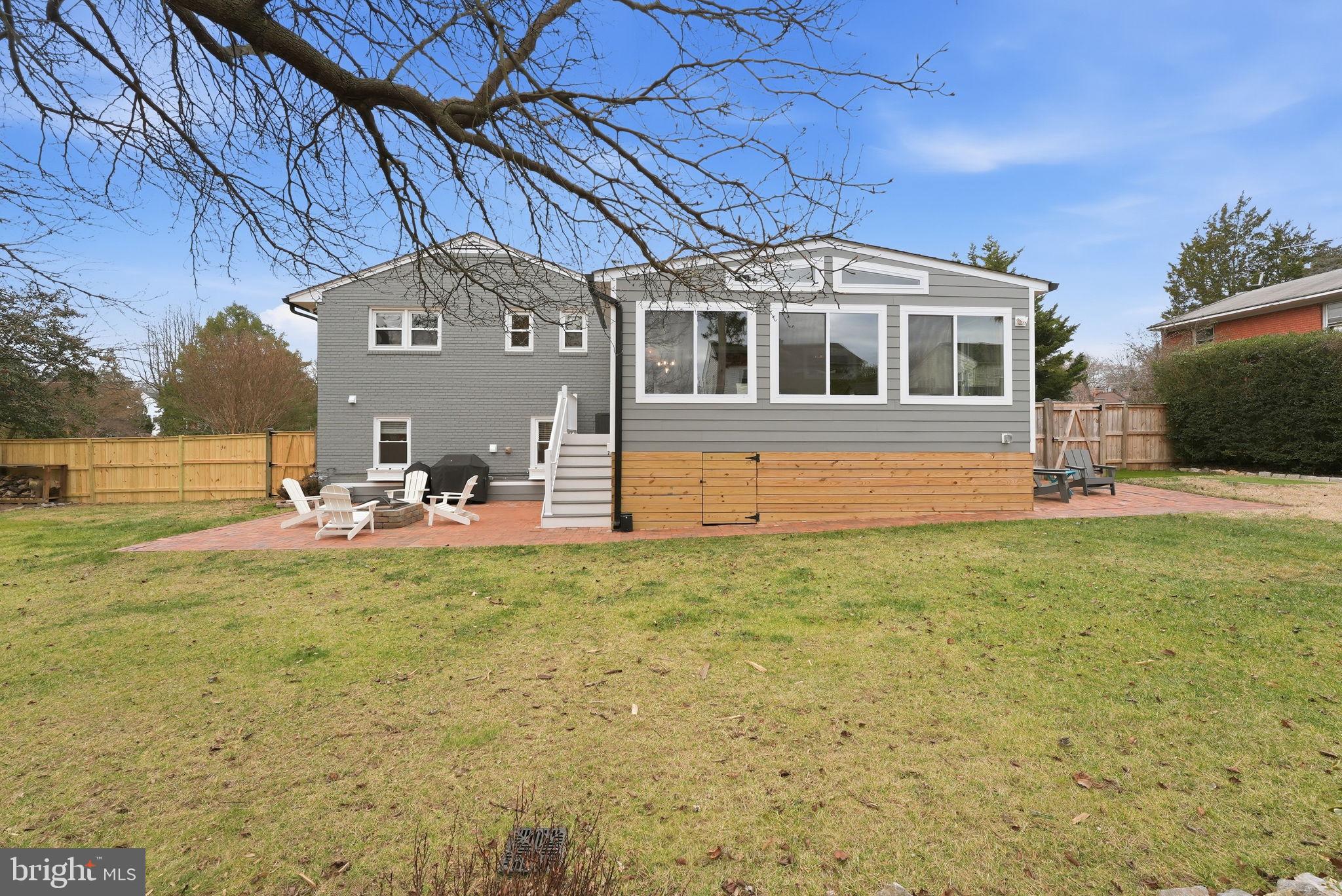 6803 Derrell Court Alexandria, VA 22307 - Photo 36 of 43 a view of a house with a backyard