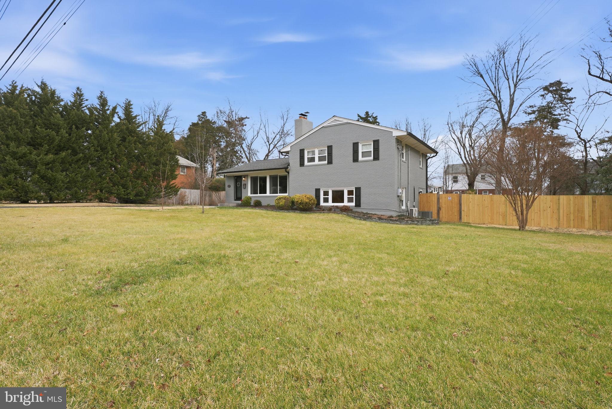 6803 Derrell Court Alexandria, VA 22307 - Photo 39 of 43 a view of a house with a yard