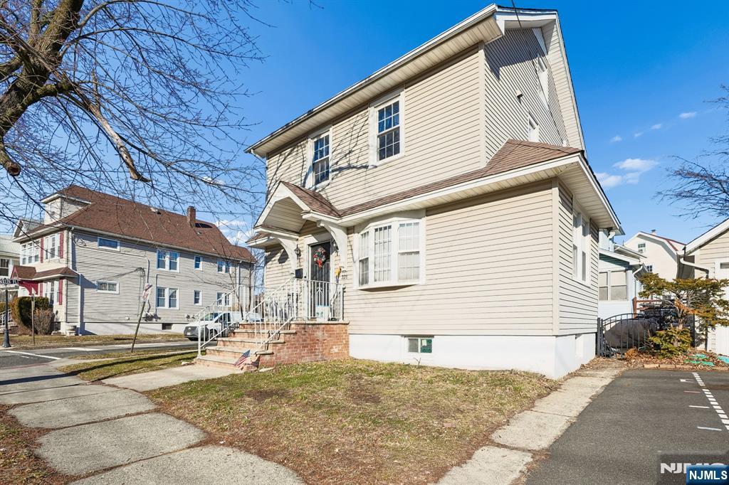 228 Totowa Road Totowa, NJ 07512 - Photo 1 of 39 a view of a street with houses