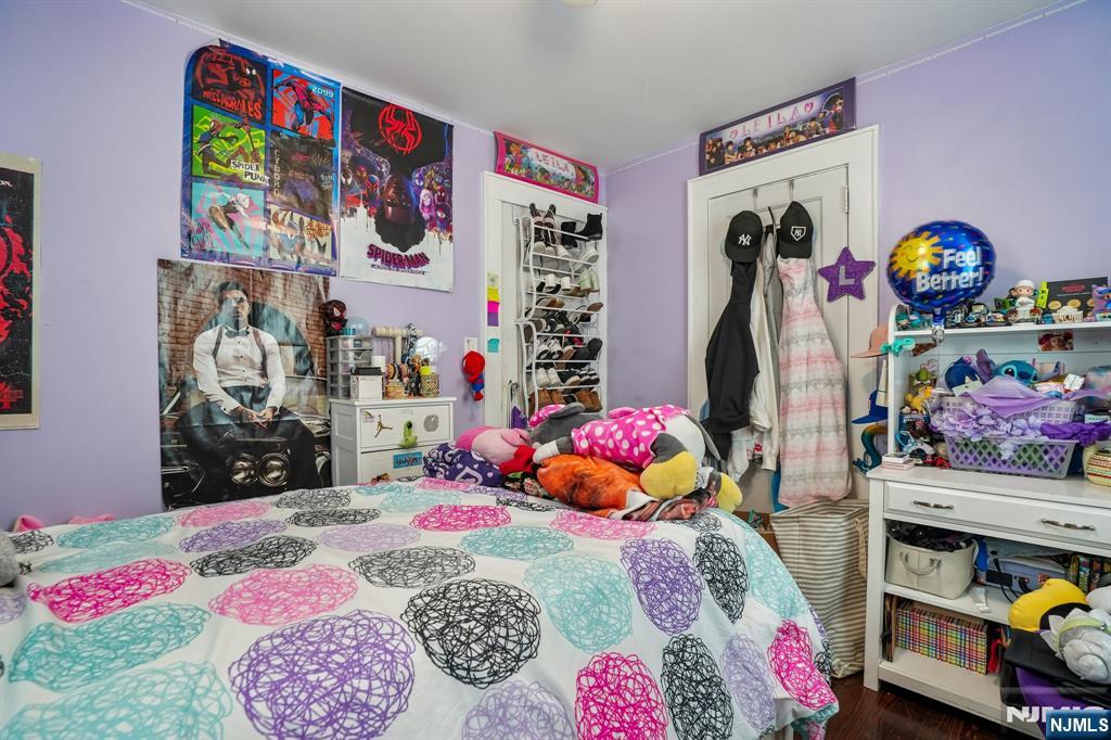 228 Totowa Road Totowa, NJ 07512 - Photo 18 of 39 a bedroom with toys and a bed