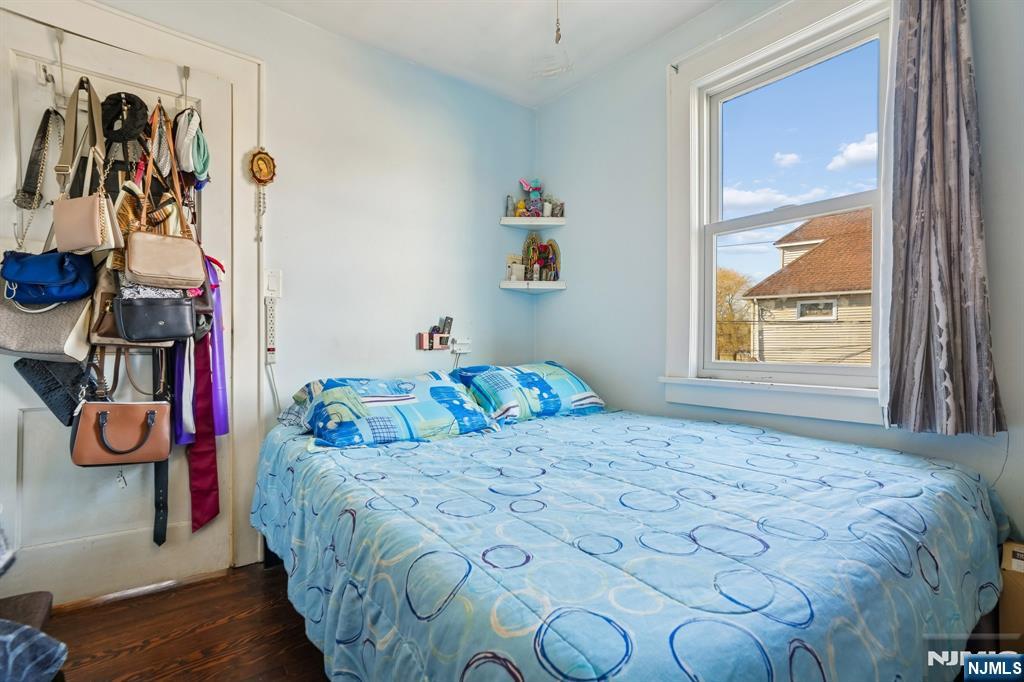 228 Totowa Road Totowa, NJ 07512 - Photo 20 of 39 a bedroom with a bed and a window