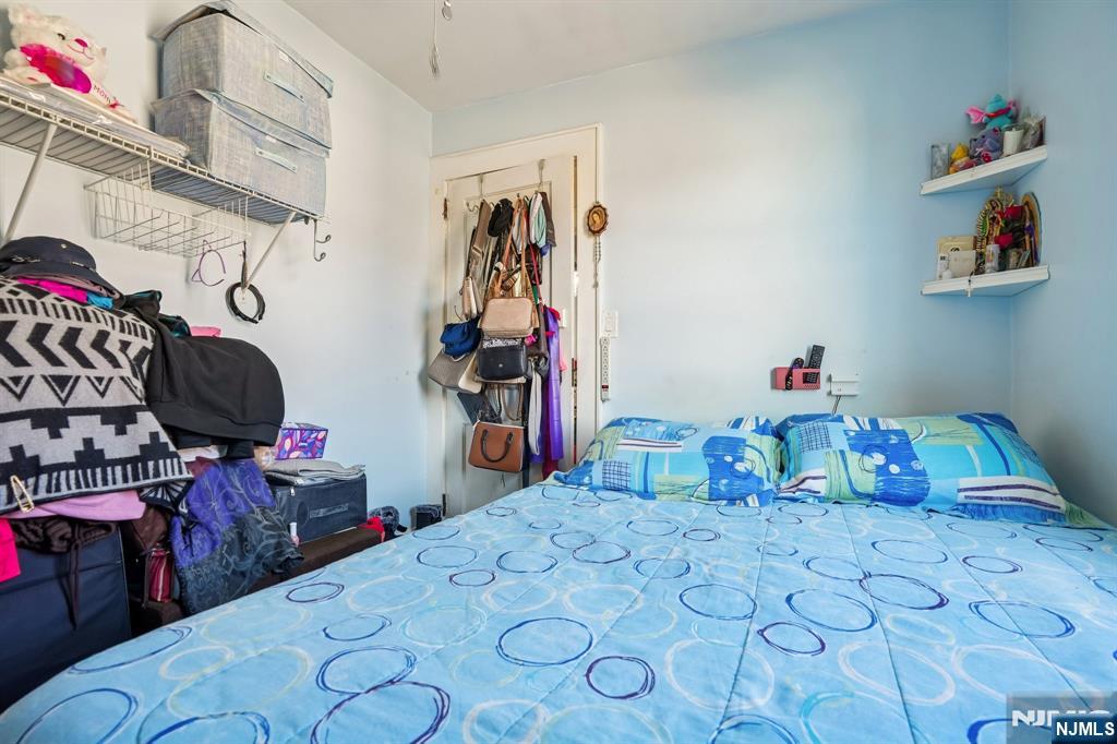 228 Totowa Road Totowa, NJ 07512 - Photo 21 of 39 a room with gym equipment and a table