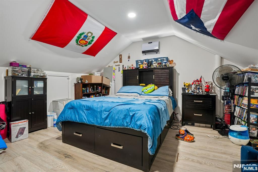 228 Totowa Road Totowa, NJ 07512 - Photo 26 of 39 a bed room with a bed and a television