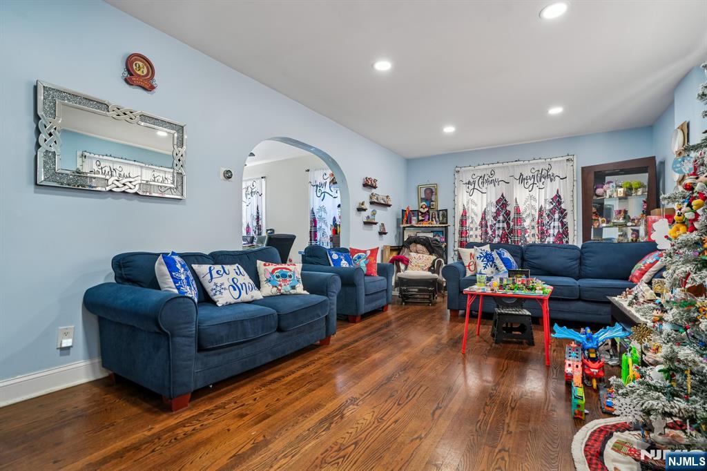 228 Totowa Road Totowa, NJ 07512 - Photo 3 of 39 a living room with furniture and wooden floor