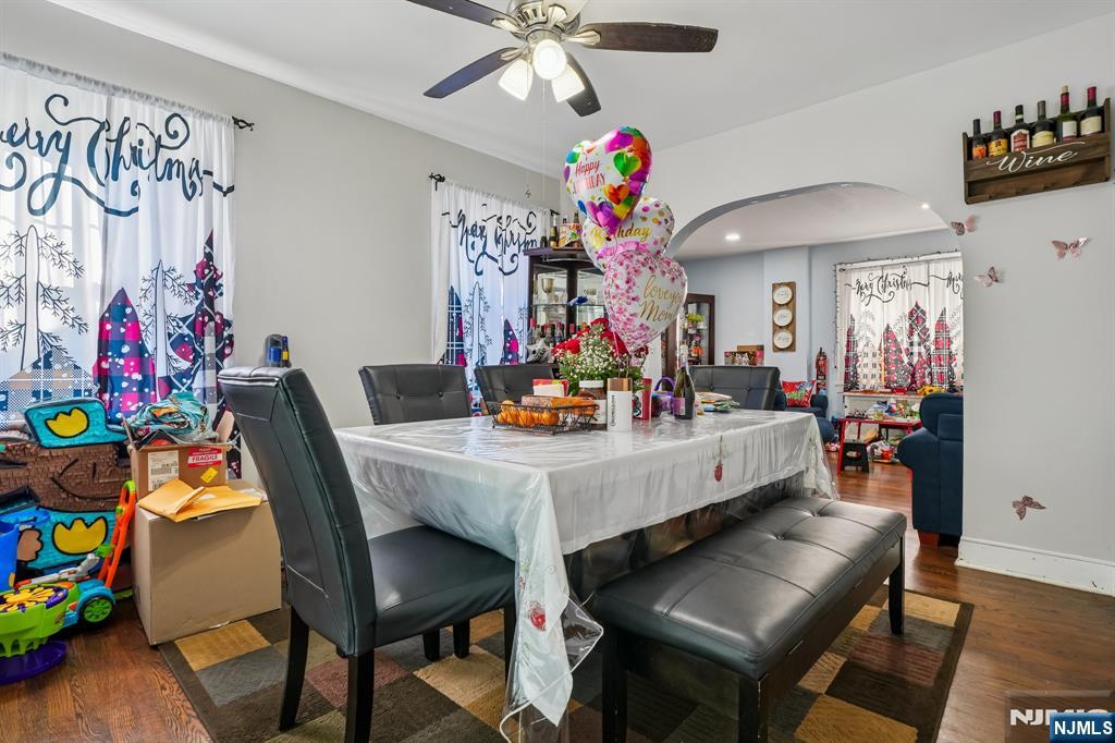 228 Totowa Road Totowa, NJ 07512 - Photo 7 of 39 a view of a dining room with furniture and a chandelier