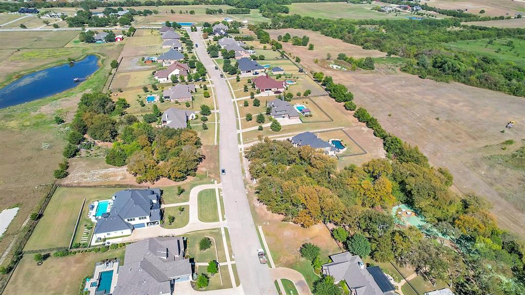 133 Falcon Point Drive Heath, TX 75032 - Photo 10 of 11 an aerial view of residential houses with outdoor space