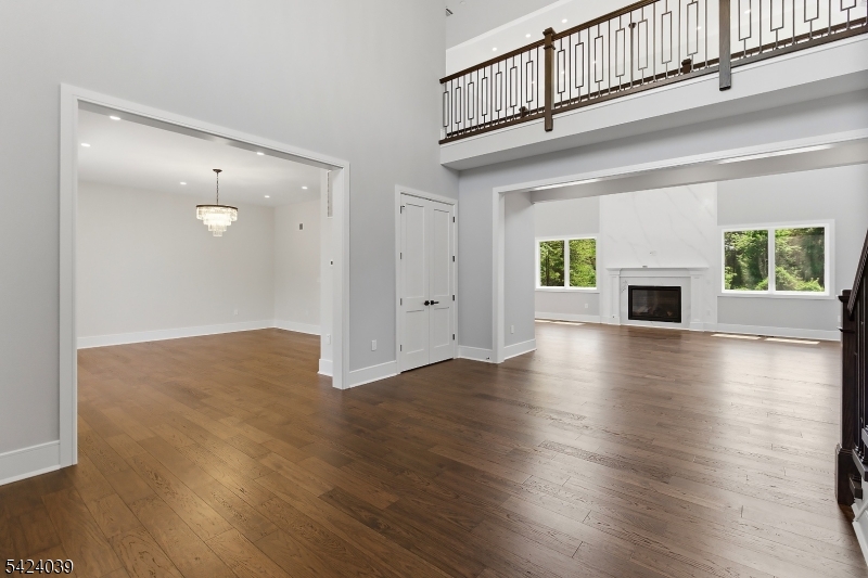 45 Kildee Road Belle Mead, NJ 08502 - Photo 8 of 43 an empty room with wooden floor and fireplace