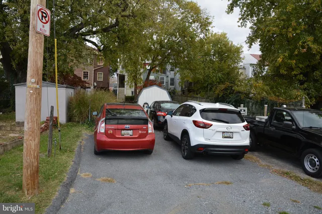 a view of a back yard of the building