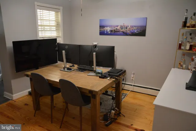 a kitchen with a refrigerator and window