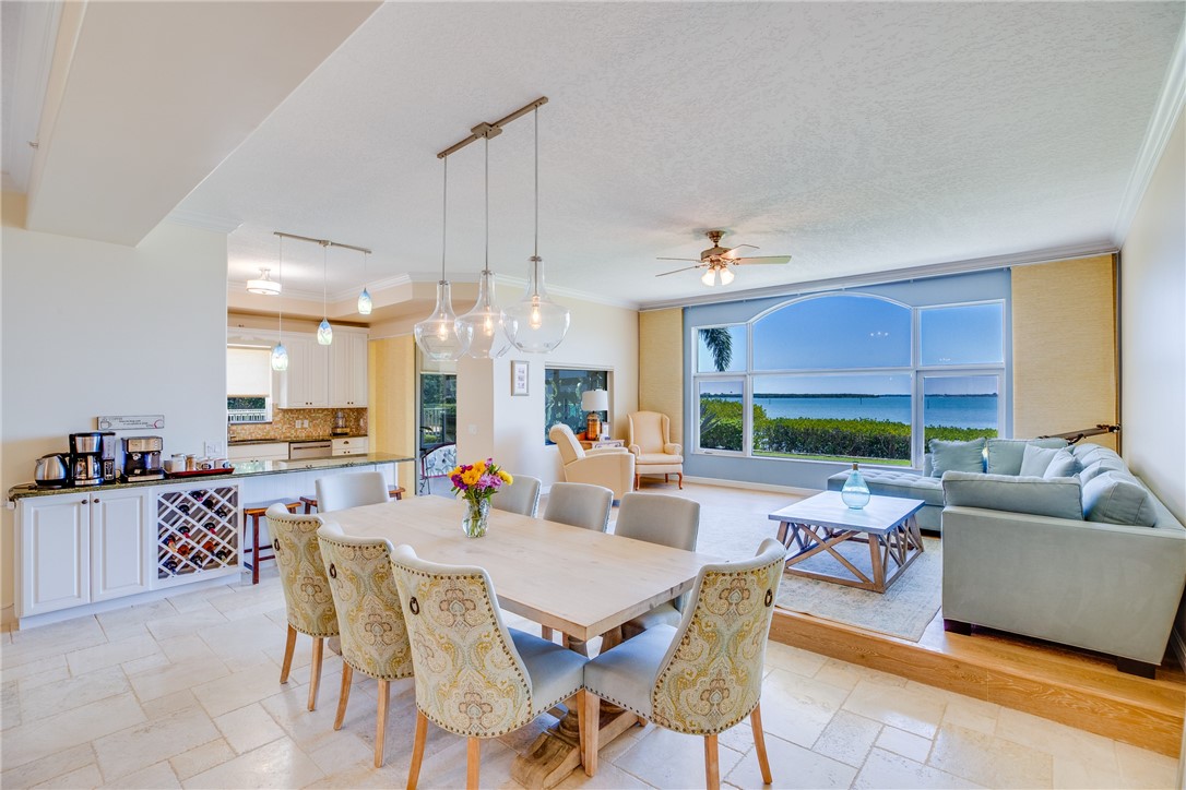 1701 Gulfstream Avenue, Unit 719 Fort Pierce, FL 34949 - Photo 11 of 36 a view of a dining room with furniture window and outside view