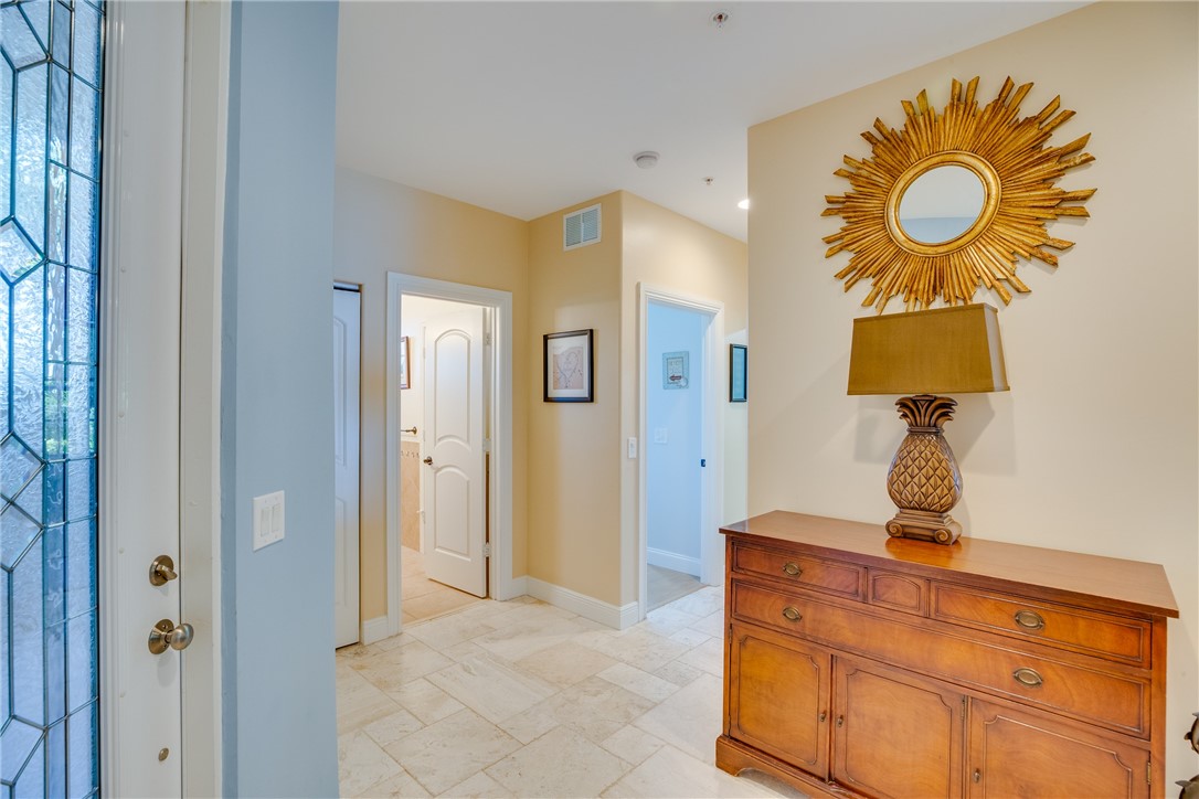 1701 Gulfstream Avenue, Unit 719 Fort Pierce, FL 34949 - Photo 5 of 36 a view of hallway with wooden floor