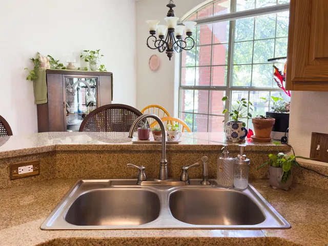 a bedroom with furniture and a window