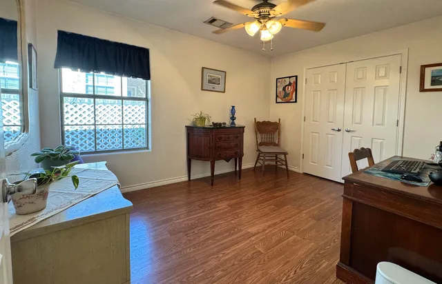 a view of a livingroom with furniture and a furniture