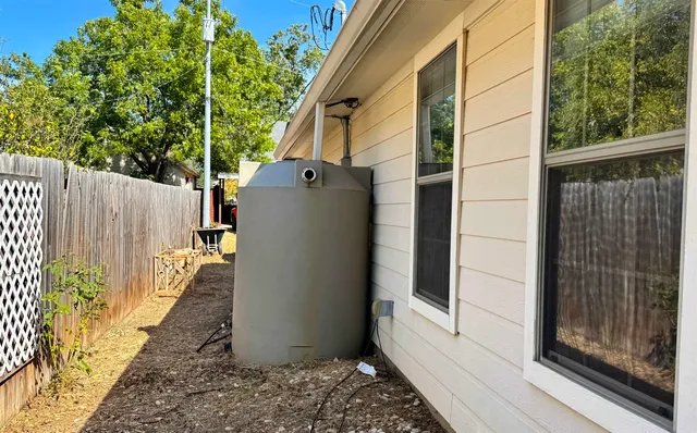 a view of a backyard with a patio