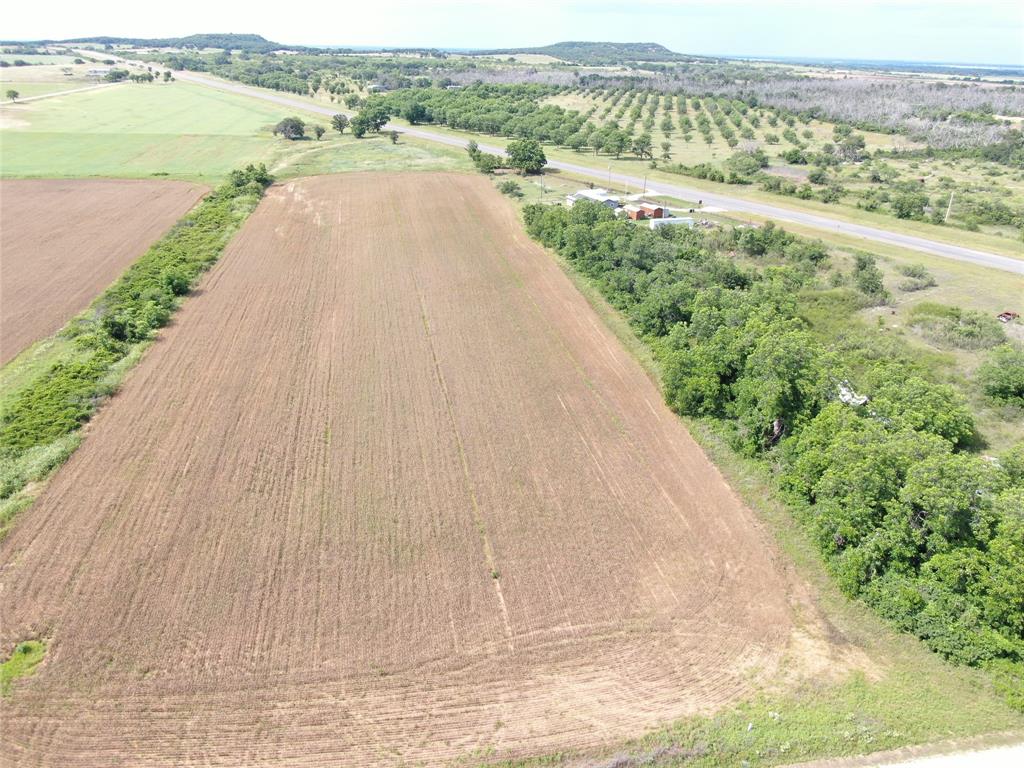 183 North West Rising Star, TX 76471 - Photo 5 of 17 a view of a lake with a big yard