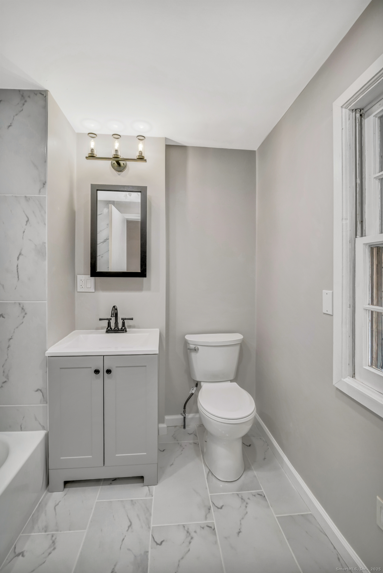 360 Old Sherman Hill Road Woodbury, CT 06798 - Photo 12 of 19 a bathroom with a toilet sink and mirror