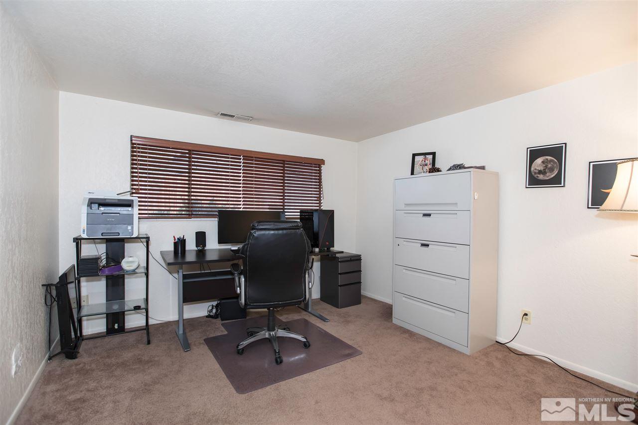 13965 Rancheros Drive Reno, NV 89521 - Photo 13 of 25 a view of a workspace with furniture