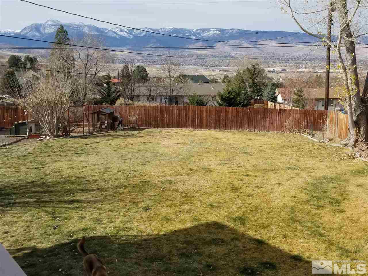 13965 Rancheros Drive Reno, NV 89521 - Photo 16 of 25 a view of a lake with a mountain view