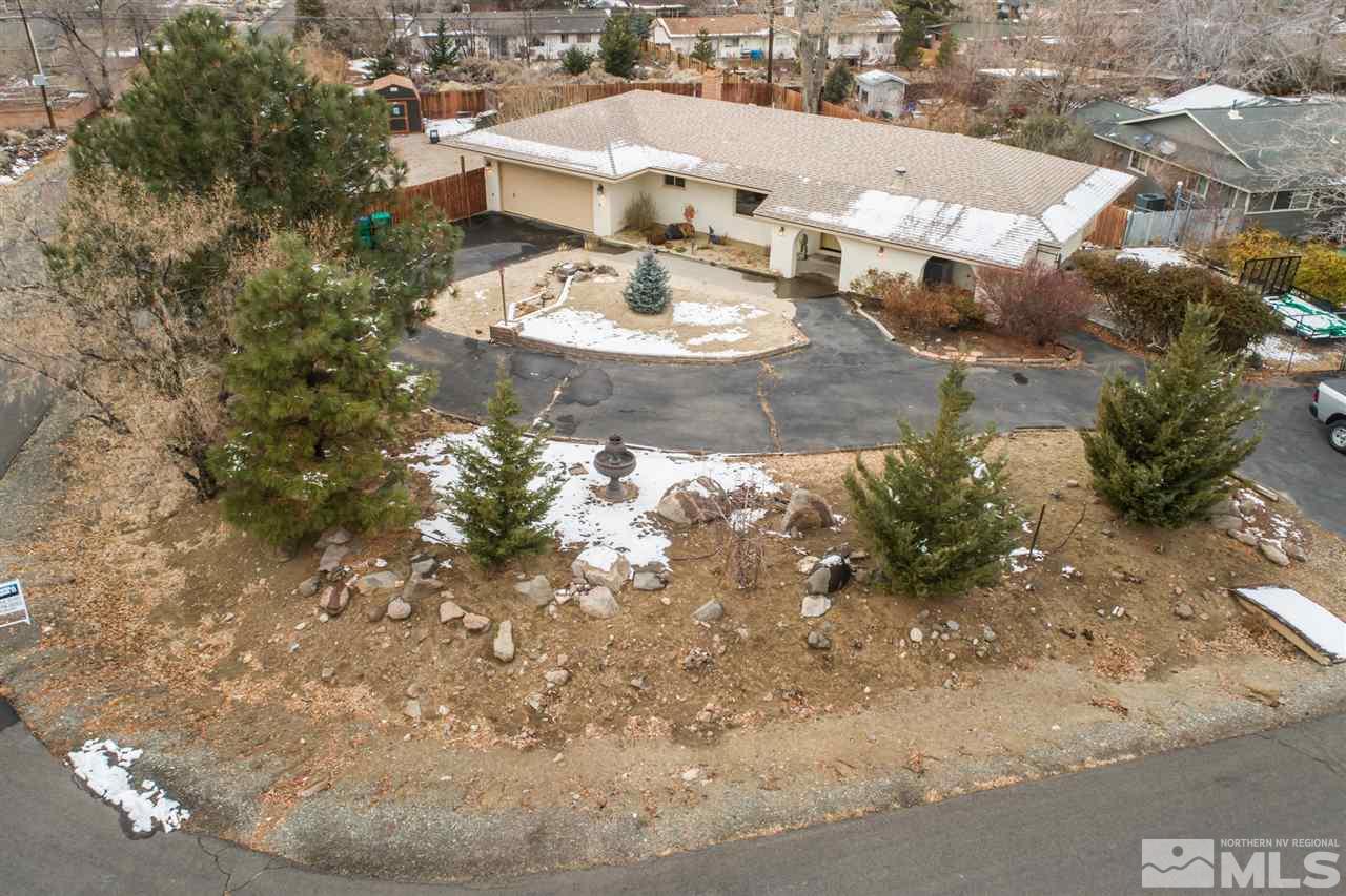 13965 Rancheros Drive Reno, NV 89521 - Photo 25 of 25 a view of a house with a yard
