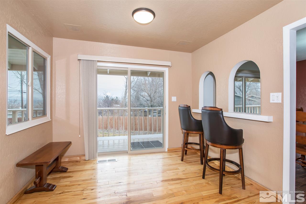 13965 Rancheros Drive Reno, NV 89521 - Photo 6 of 25 a living room with furniture and a window