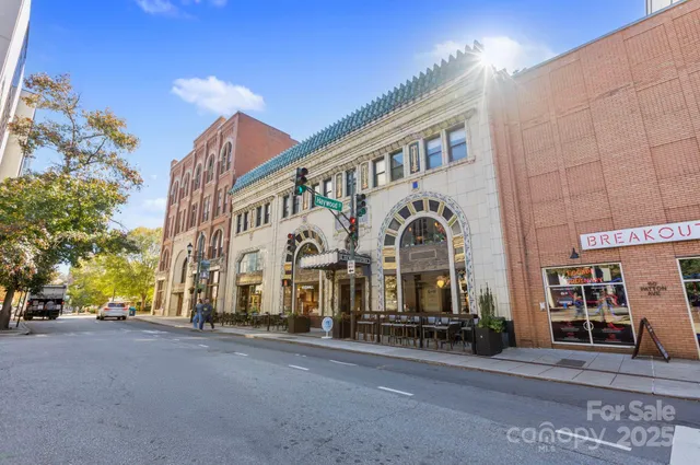 a view of a building with a street