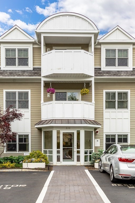 220 Humphrey Street, Unit 204 Marblehead, MA 01945 - Photo 2 of 29 front view of a building with a street