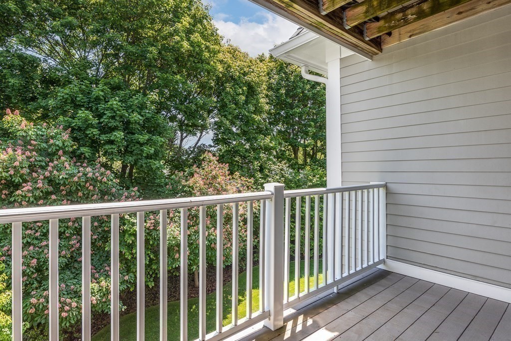 220 Humphrey Street, Unit 204 Marblehead, MA 01945 - Photo 24 of 29 a view of a balcony with wooden floor