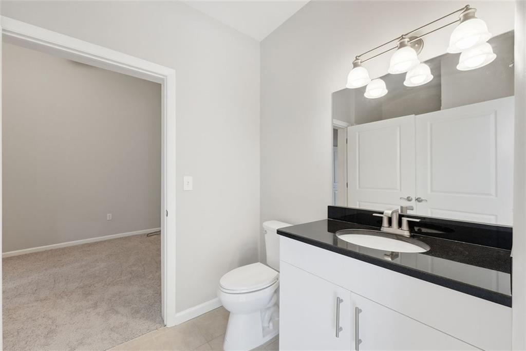 3400 Malone Drive, Unit 206 Atlanta, GA 30341 - Photo 13 of 31 a bathroom with a sink and a toilet