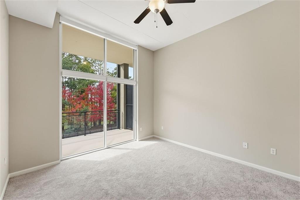 3400 Malone Drive, Unit 206 Atlanta, GA 30341 - Photo 15 of 31 an empty room with windows and outdoor view