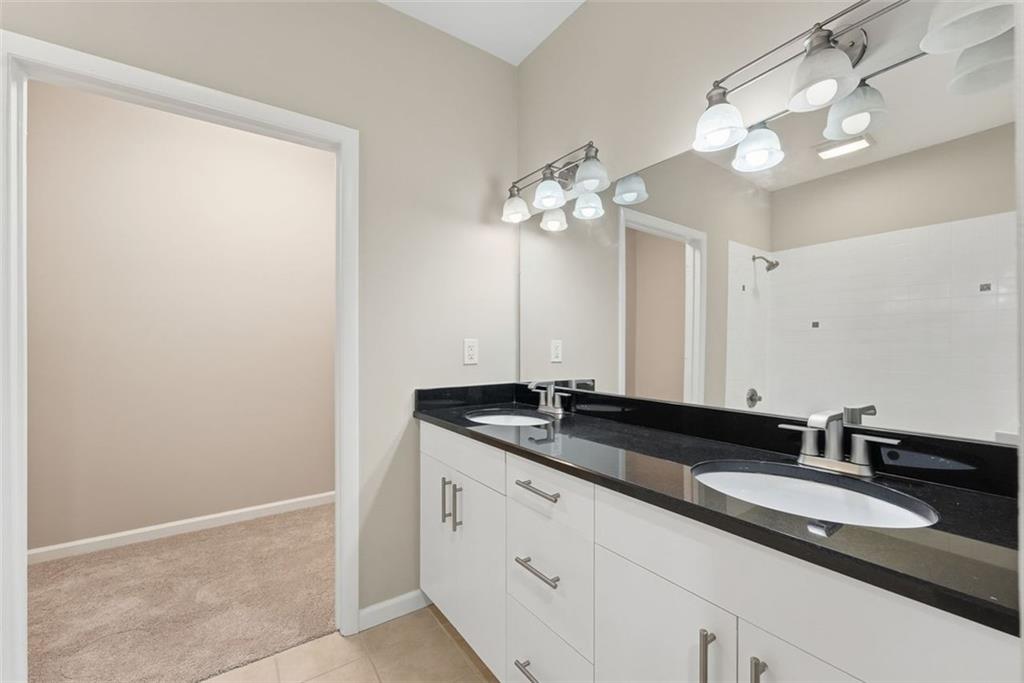 3400 Malone Drive, Unit 206 Atlanta, GA 30341 - Photo 19 of 31 a close view of a sink and a mirror in a bathroom