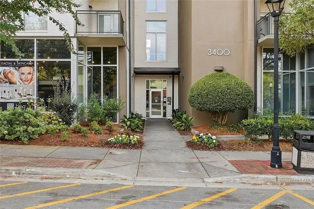 a front view of a house having garden