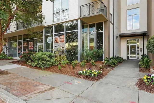 a house with a potted plant in front of it