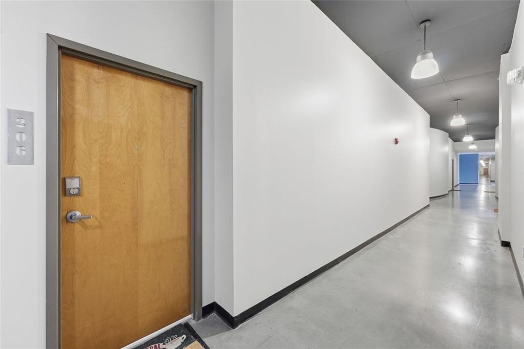 3400 Malone Drive, Unit 206 Atlanta, GA 30341 - Photo 27 of 31 a view of a hallway with a large window