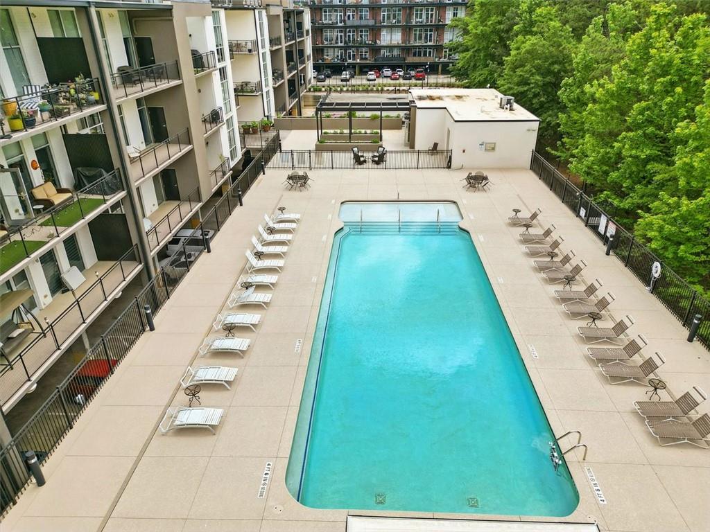 3400 Malone Drive, Unit 206 Atlanta, GA 30341 - Photo 31 of 31 a swimming pool with tall buildings