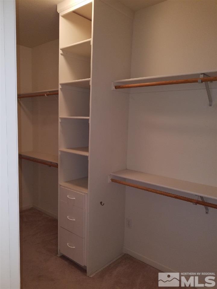 11000 Osage Road Reno, NV 89508 - Photo 17 of 20 a view of walk in closet with empty racks