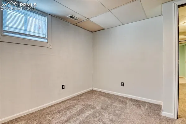 a view of a room that has a window