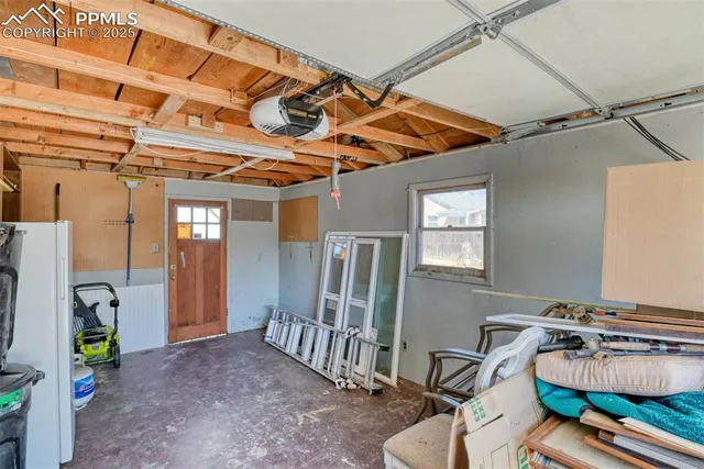 a bedroom with furniture and a bed