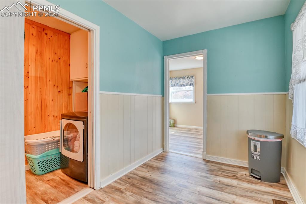 2409 Wahsatch Avenue Colorado Springs, CO 80907 - Photo 9 of 47 a view of a storage and utility room with wooden floor