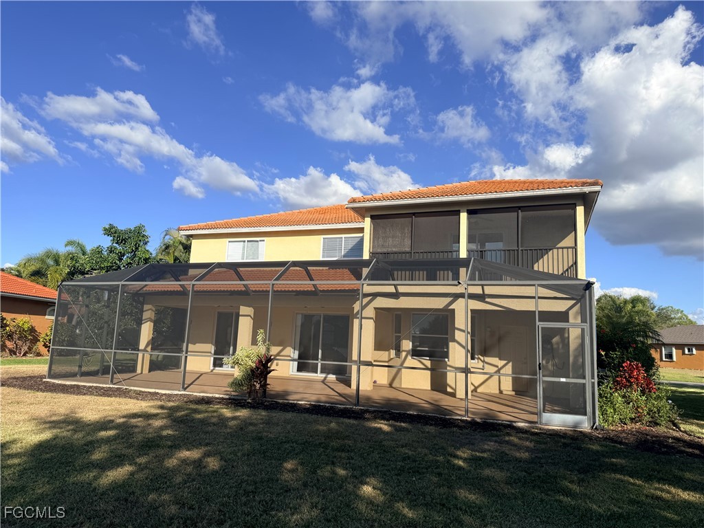 4577 Fairloop Run Lehigh Acres, FL 33973 - Photo 35 of 35 front view of a house with a yard