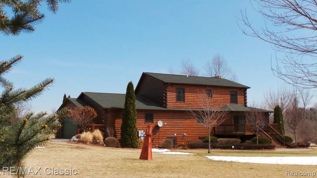 2447 North Hacker Road Howell, MI 48855 - Photo 4 of 62 Rear views