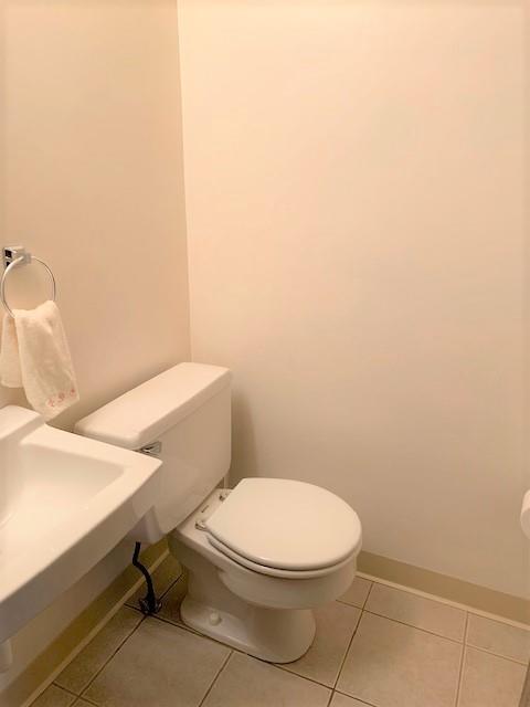 1141 12th Street McKees Rocks, PA 15136 - Photo 8 of 25 a white toilet sitting next to a white cabinet