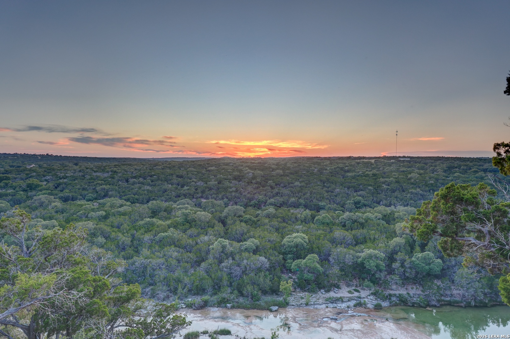 189 Cherry Springs Road Hunt, TX 78024 - Photo 17 of 34 a view of a city with lush green forest