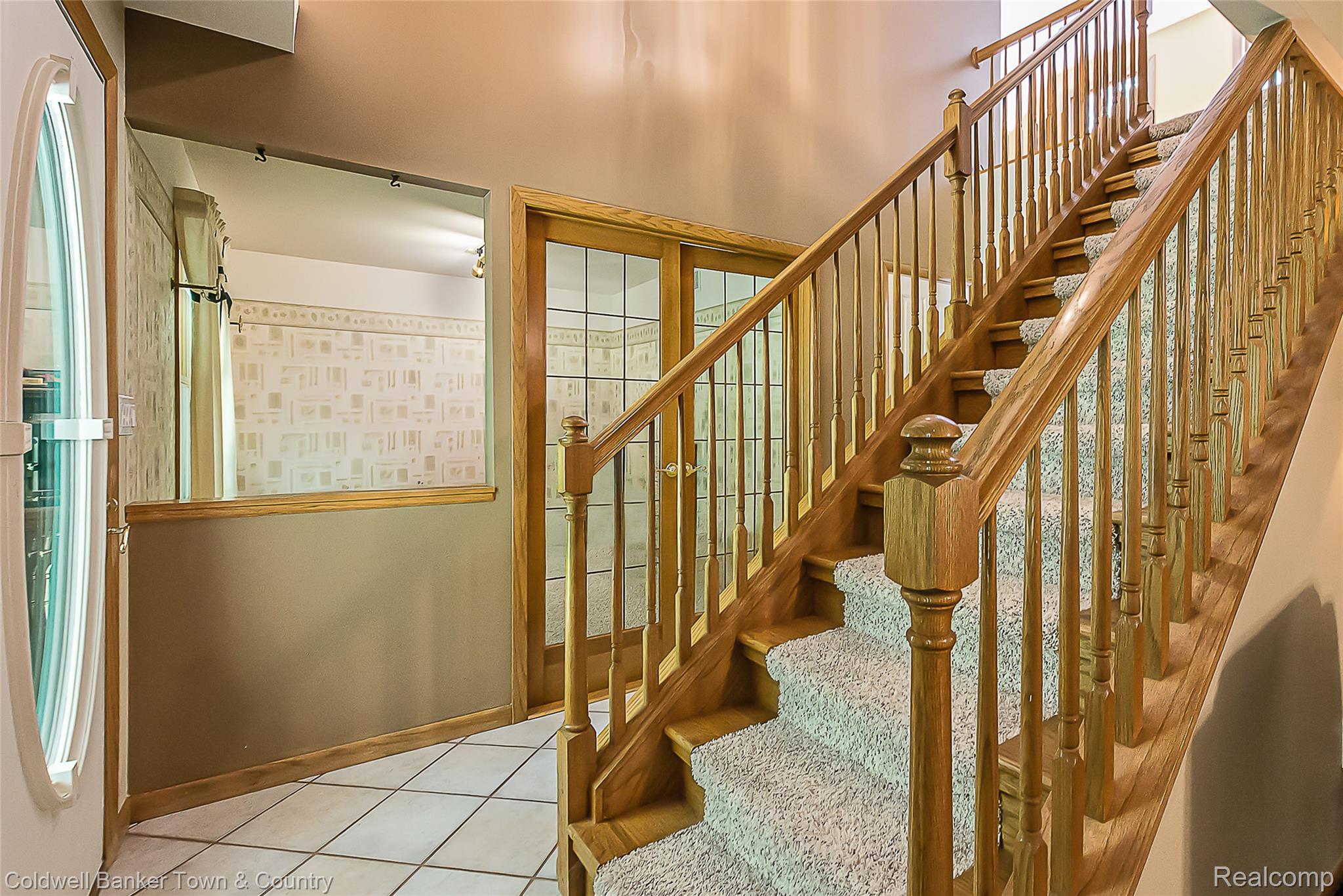 11527 Mcgregor Road Pinckney, MI 48169 - Photo 6 of 26 Stairs featuring tile patterned flooring