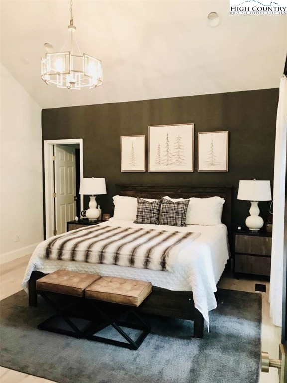 509 Crystal Mountain Road Boone, NC 28607 - Photo 16 of 24 a bedroom with bed and window