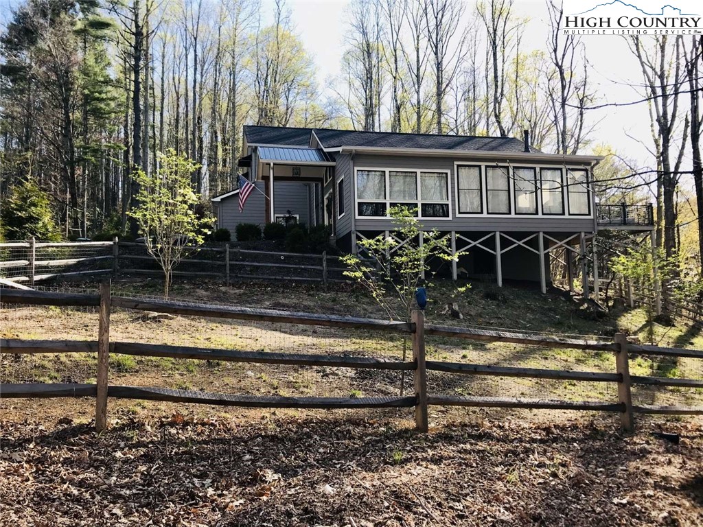 509 Crystal Mountain Road Boone, NC 28607 - Photo 3 of 24 a view of a house with a yard